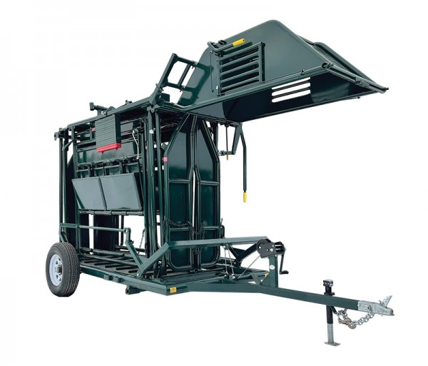 Hi-Hog's Multi-Transport Trailer (758 lbs) with a Manual Bison Squeeze Chute (3108 lbs) with a total weight of (3866 lbs) a multi purpose trailer loaded with a Bison squeeze chute.
